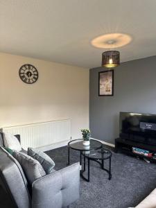 Posezení v ubytování Sark drive Serenity-Cosy 3BR House in Birmingham