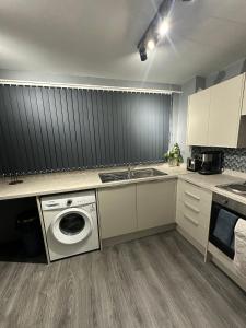 Kuchyň nebo kuchyňský kout v ubytování Sark drive Serenity-Cosy 3BR House in Birmingham + 27 fotografií