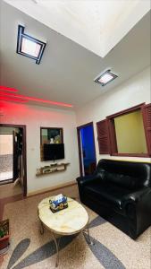 TV a/nebo společenská místnost v ubytování Appartement au centre de TIZNIT