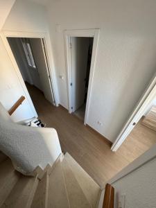 Łóżko lub łóżka w pokoju w obiekcie Bonito triplex con increíbles vistas