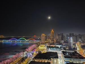 Nespecifikovaný výhled na destinaci Charbin nebo výhled na město při pohledu z apartmánu