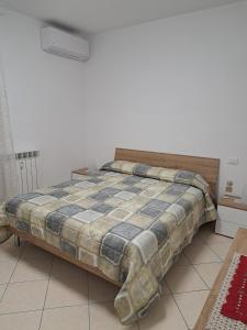 Postel nebo postele na pokoji v ubytování Appartamento Alba