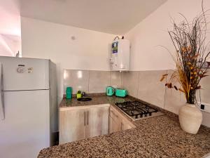 Kuchyň nebo kuchyňský kout v ubytování Carpe Diem Cabañas en Panaholma