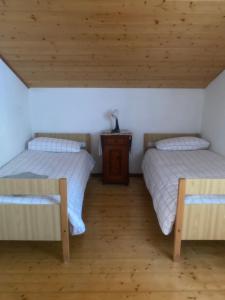 A bed or beds in a room at La casa di nonno carlo