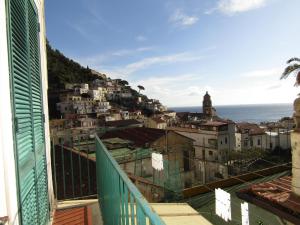 a view of a city from a building at #goldenhour in Amalfi +38 photos