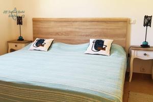 Ένα ή περισσότερα κρεβάτια σε δωμάτιο στο A Casa Apa