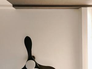 a pair of spoons hanging on a wall at The Hideaway ROOMah in Miri