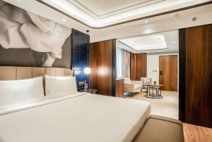 Ein Bett oder Betten in einem Zimmer der Unterkunft Radisson Blu Hotel Ahmedabad
