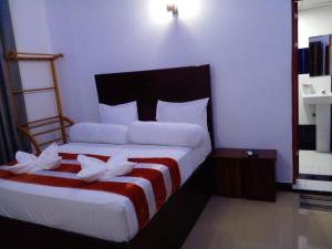 Voodi või voodid majutusasutuse Wilroma Hotel&Resort toas