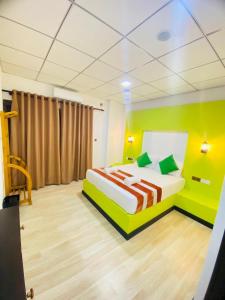 Voodi või voodid majutusasutuse Wilroma Hotel&Resort toas