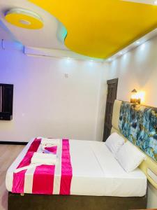 Voodi või voodid majutusasutuse Wilroma Hotel&Resort toas