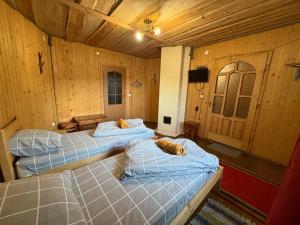 Postel nebo postele na pokoji v ubytování Hotel Zlagoda