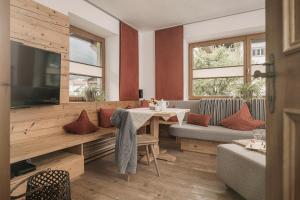 TV a/nebo společenská místnost v ubytování Apart Central – Premium Mountain&Garden + 37 fotografií