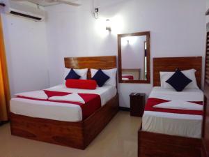 Voodi või voodid majutusasutuse Wilroma Hotel&Resort toas