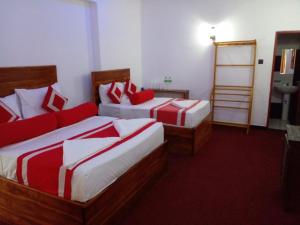 Voodi või voodid majutusasutuse Wilroma Hotel&Resort toas