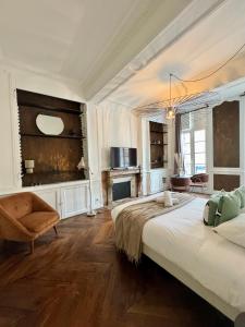 Postel nebo postele na pokoji v ubytování Les lices, centre ville de Rennes