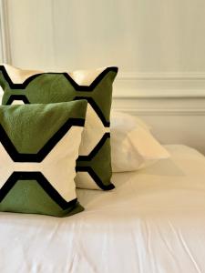 Postel nebo postele na pokoji v ubytování Les lices, centre ville de Rennes + 18 fotografií