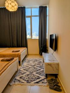 Postel nebo postele na pokoji v ubytování TheGrid-HomeStay + 7 fotografií