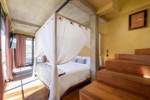 Postel nebo postele na pokoji v ubytování Sumba Lodge