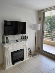 TV/trung tâm giải trí tại Espectacular departamento en Algarrobo