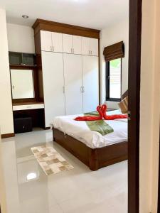 Postel nebo postele na pokoji v ubytování Natural Home The connect soi 2