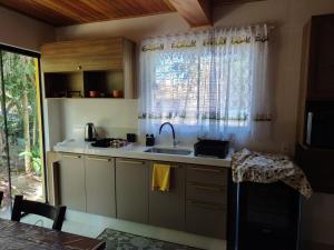 Gallery image of Chalé Girassol in Itapema +16 photos