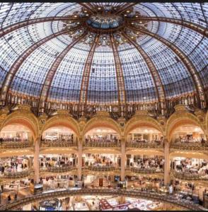 a large building with a large glass domed ceiling at appartement 5min gare RER Disneyland Paris val d'Europe la vallée Village parking inclus in Montévrain +30 photos