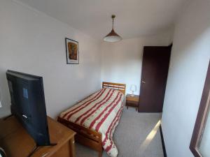Postel nebo postele na pokoji v ubytování Cabana Algarrobo