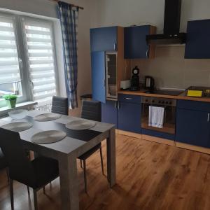 Kuchyň nebo kuchyňský kout v ubytování Ferienwohnung Trifkovic 2