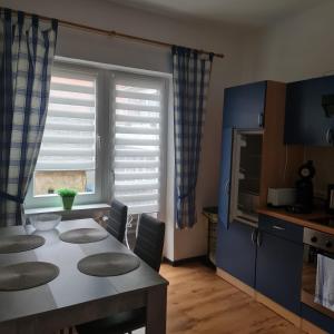 Kuchyň nebo kuchyňský kout v ubytování Ferienwohnung Trifkovic 2