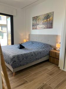 Ένα ή περισσότερα κρεβάτια σε δωμάτιο στο VillaMartin - Valentino Golf - Casa Le Grande 38