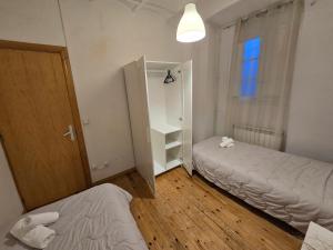 A bed or beds in a room at Spacious apartment in Bellver de Cerdanya 150 m² with balcony