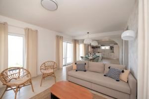 a living room with a couch and a table at Villa Zen Oaza in Poljica