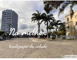 ein Zeichen, das keine Milderung in einer Stadt mit Palmen anzeigt in der Unterkunft PROMOÇÃO INAUGURAÇÃO - Apto Melhor localização in São José da Coroa Grande