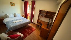 Ένα ή περισσότερα κρεβάτια σε δωμάτιο στο Sweets Suites Espinho