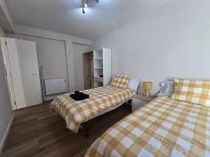 Postel nebo postele na pokoji v ubytování Martita Home + 2 fotografie