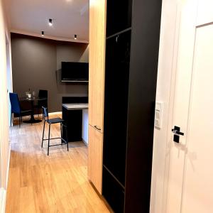 TV a/nebo společenská místnost v ubytování Apartament Warmia - Grzegorzewska