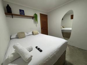 Ένα ή περισσότερα κρεβάτια σε δωμάτιο στο Casas Pipa Brasil