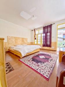 Postel nebo postele na pokoji v ubytování Hotel Dhungri valley