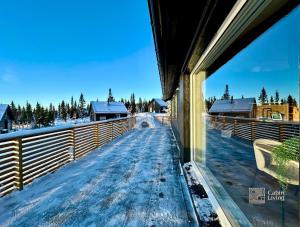Cozy cabin on Sjusjølia by the trail network sauna v zimě