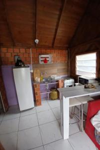 Una cocina o cocineta en Cabana 01 2 fotos más
