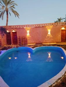 Bazén v ubytování The Green Siwa Hotel nebo v jeho okolí