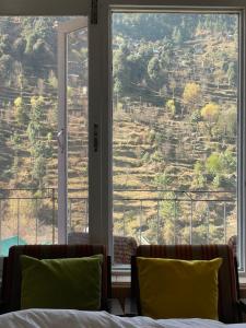Zona d'estar a Hotel Cedar View Jibhi