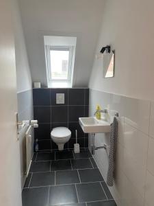 Ένα μπάνιο στο Apartment Walddorf