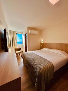 Postel nebo postele na pokoji v ubytování Hit Hotel + 37 fotografií