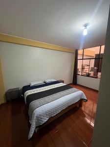 Postel nebo postele na pokoji v ubytování 2da Habitacion a 1 cuadra de la Plaza