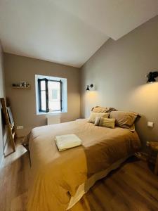 Ένα ή περισσότερα κρεβάτια σε δωμάτιο στο Maison petite côte