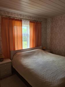 Postel nebo postele na pokoji v ubytování SIRELISURU KÜLALISTEMAJA