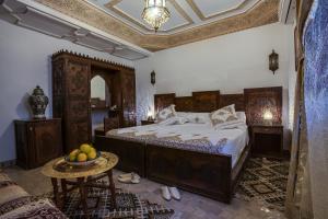 Postel nebo postele na pokoji v ubytování Riad Salam Fes