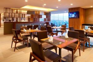 TV a/nebo společenská místnost v ubytování Marriott Tuxtla Gutierrez Hotel